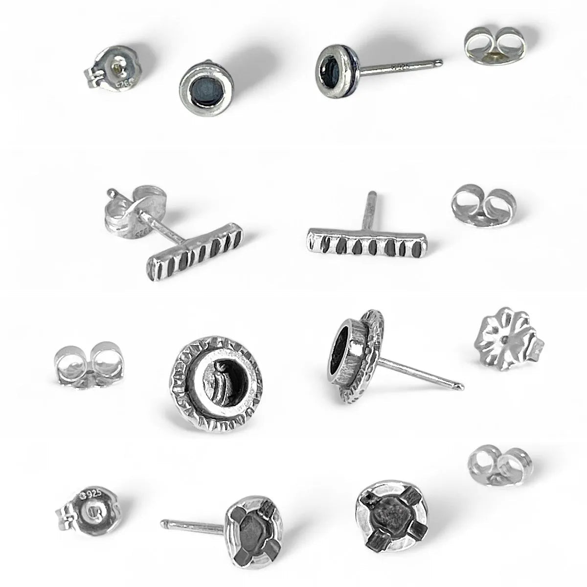 A variety of Kristin Christopher sterling silver stud earrings