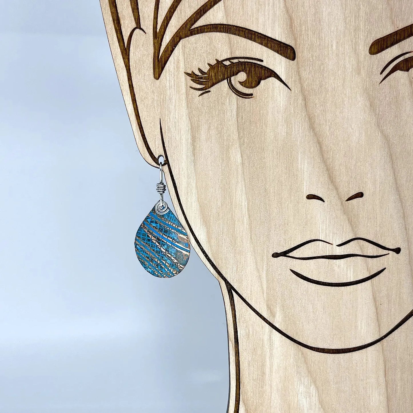 View on model of Teardrop Copper Blue Patina Earrings by Kristin Christopher